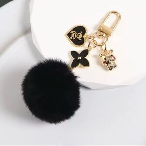 Black Fluffy Bag Charm with Gold Charms